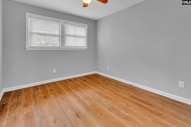 spare room with ceiling fan and light hardwood / wood-style floors