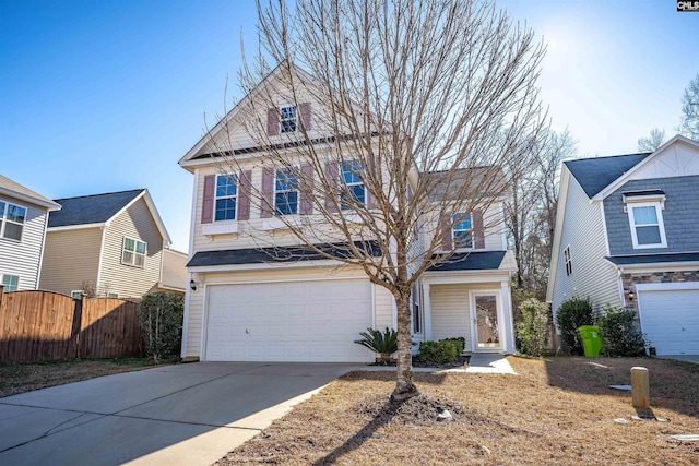 front of property with a garage