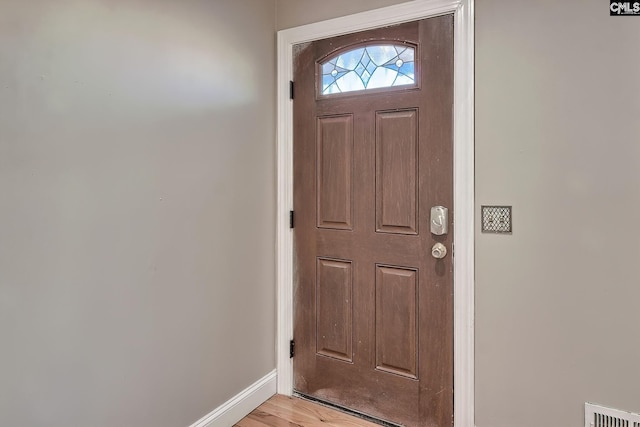 entryway with light hardwood / wood-style floors