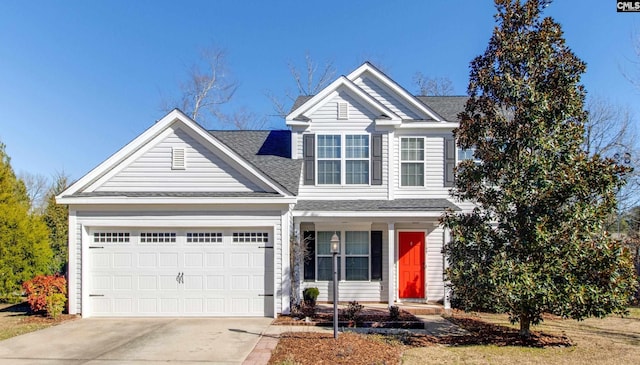 view of front of home with a garage