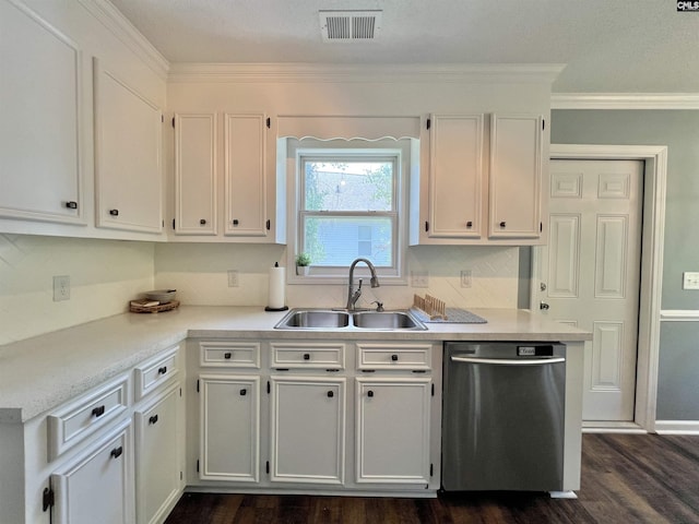 kitchen featuring white cabinets, ornamental molding, sink, dishwasher, and dark hardwood / wood-style floors