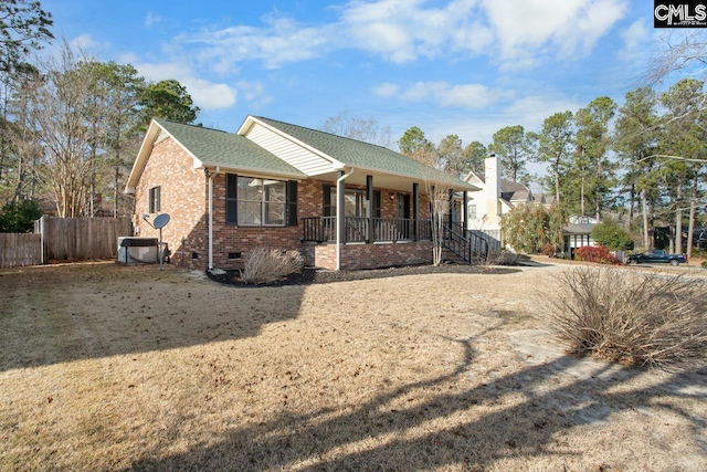 ranch-style house featuring a porch