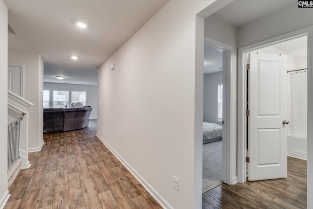 corridor featuring hardwood / wood-style flooring