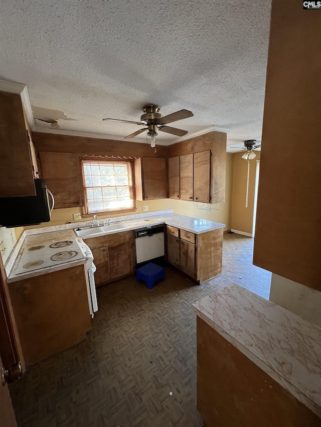 kitchen featuring a textured ceiling, dark parquet floors, white dishwasher, ceiling fan, and range