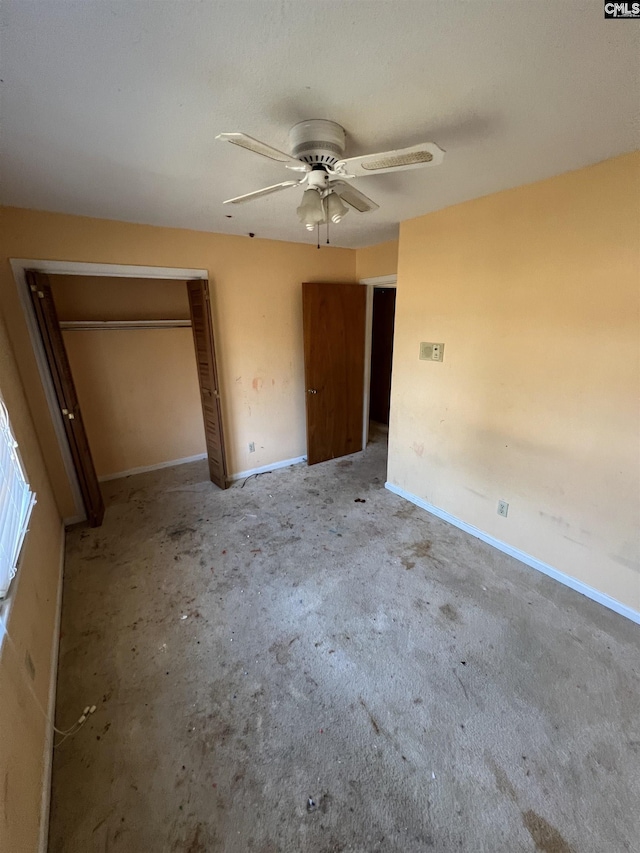 unfurnished bedroom with a closet and ceiling fan