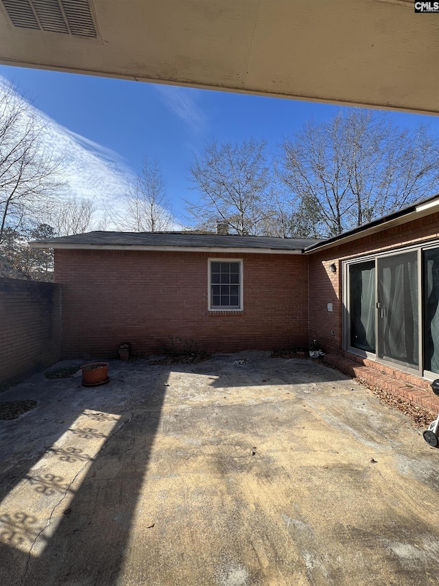 rear view of house with a patio area