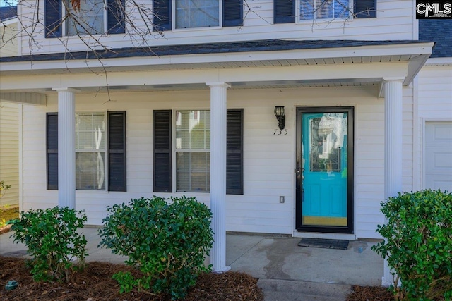 property entrance with covered porch