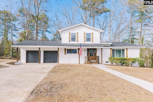 front of property with a garage