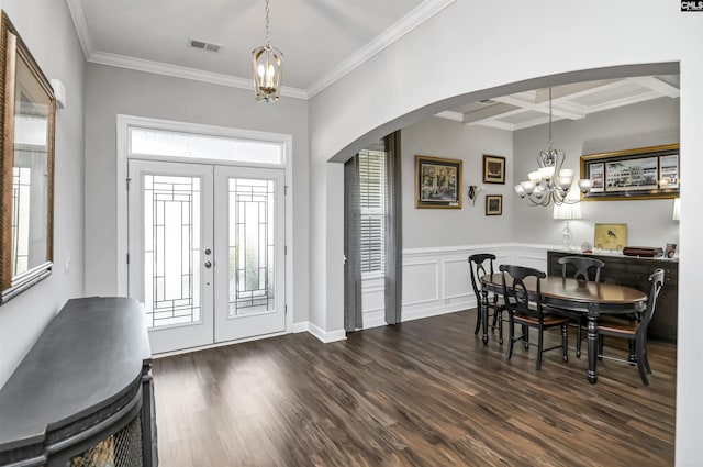 foyer entrance with beam ceiling, a wealth of natural light, french doors, and coffered ceiling