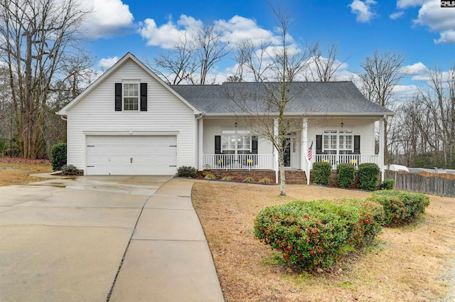 view of front facade featuring a porch and a garage