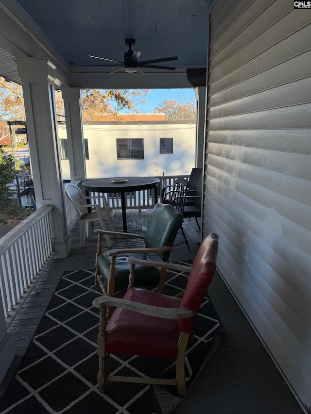 view of patio featuring ceiling fan and covered porch