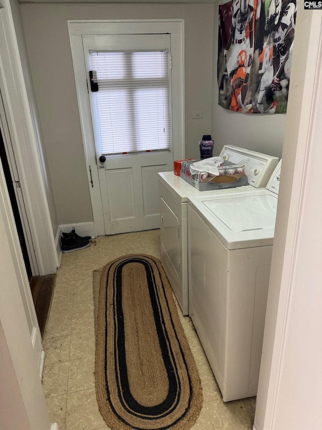 laundry area featuring separate washer and dryer