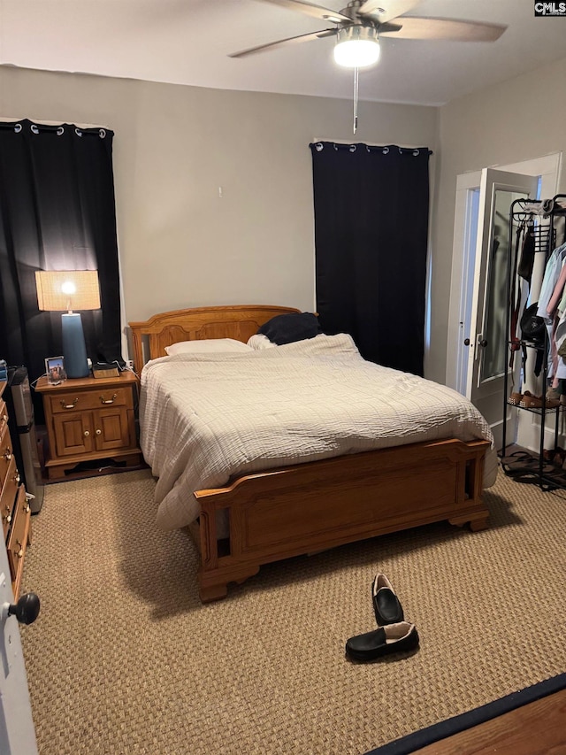 bedroom featuring carpet flooring and ceiling fan