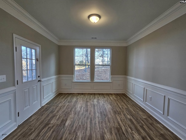 unfurnished room with crown molding, dark wood-type flooring, and a healthy amount of sunlight