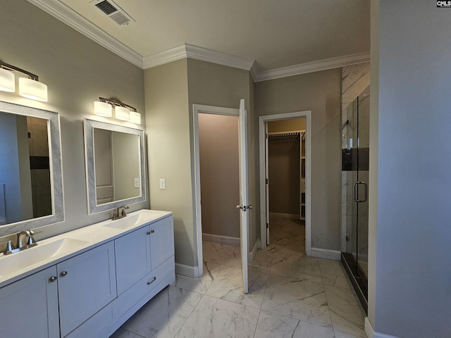 bathroom with a shower with shower door, ornamental molding, and vanity