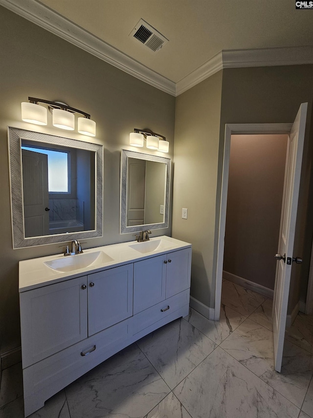 bathroom with vanity and ornamental molding