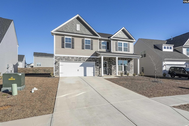 view of front of property featuring a garage and central air condition unit