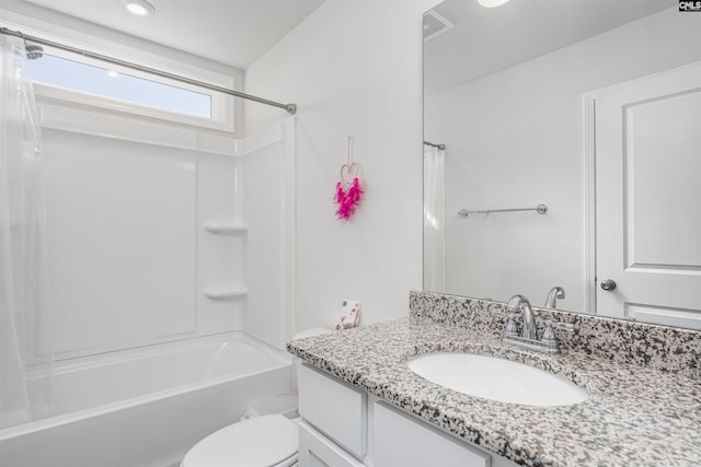 full bathroom featuring vanity, toilet, and shower / bath combo with shower curtain