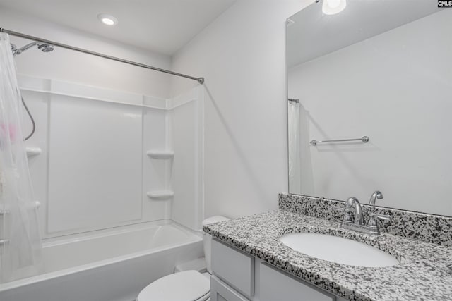 full bathroom featuring vanity,  shower combination, and toilet