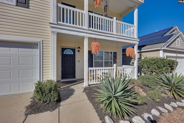 entrance to property featuring a balcony