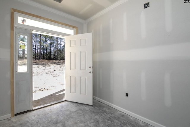 entryway with ornamental molding, concrete floors, visible vents, and baseboards