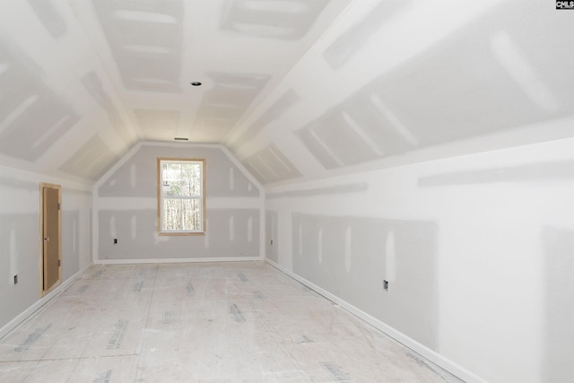 bonus room featuring lofted ceiling