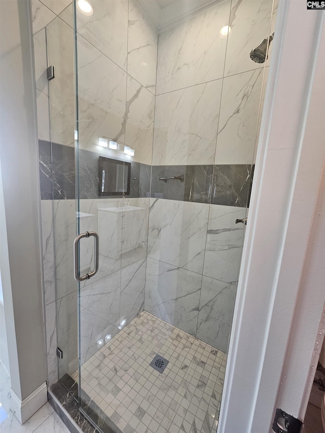 bathroom featuring an enclosed shower