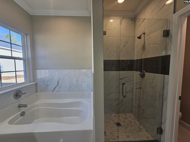 bathroom with shower with separate bathtub, toilet, and ornamental molding