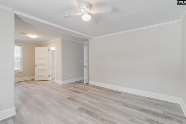 empty room featuring crown molding, light hardwood / wood-style flooring, and ceiling fan