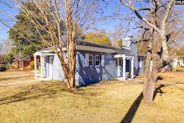 view of front of house with a front yard