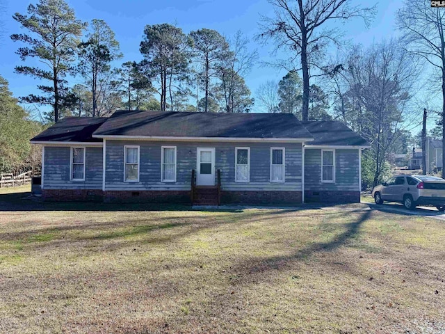 single story home with a front yard