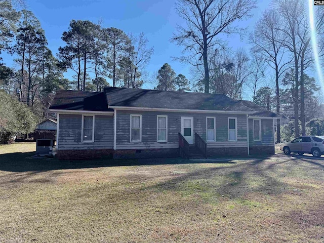 single story home with a front yard