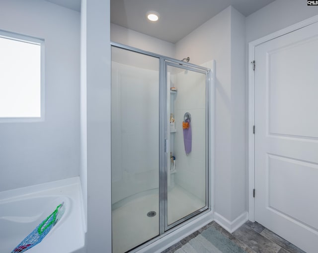 bathroom with an enclosed shower