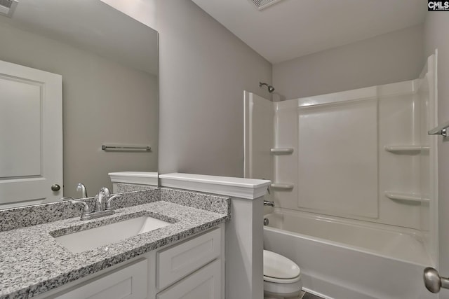 full bathroom with visible vents, toilet, vanity, and shower / bathing tub combination