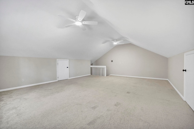 bonus room with ceiling fan, carpet floors, and lofted ceiling