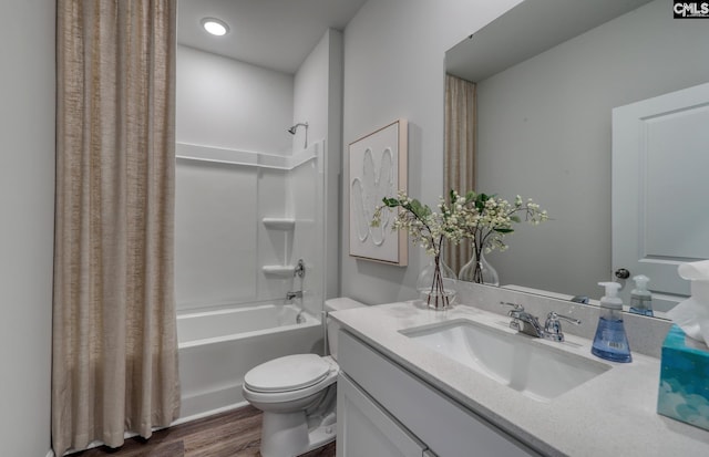 full bathroom with vanity, toilet, wood-type flooring, and shower / bathtub combination with curtain