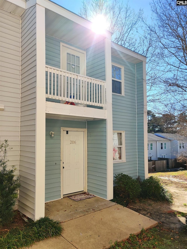 exterior space featuring a balcony