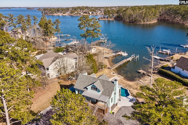 drone / aerial view with a water view