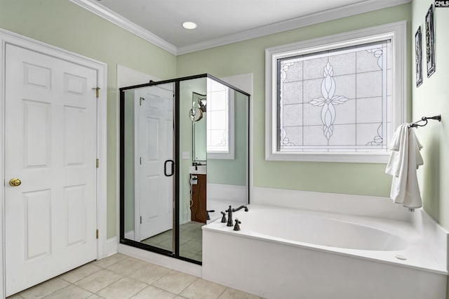 bathroom with ornamental molding, tile patterned floors, a wealth of natural light, and independent shower and bath