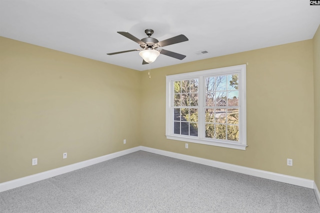 unfurnished room featuring carpet flooring and ceiling fan