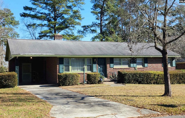 single story home with a carport and a front yard