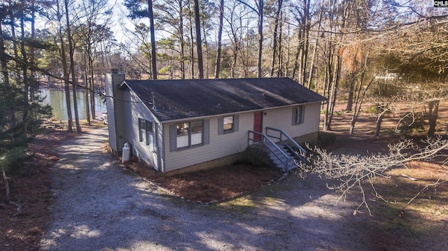 view of front of property featuring a water view