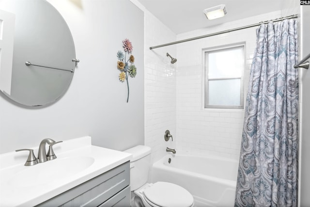 full bathroom featuring vanity, toilet, and shower / bathtub combination with curtain