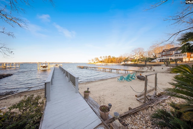 view of dock with a water view