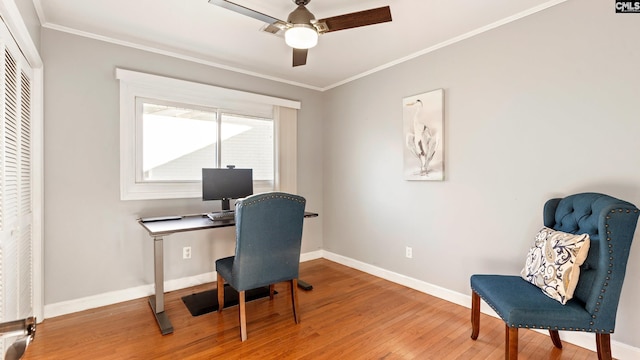 office area with ceiling fan, wood-type flooring, and crown molding