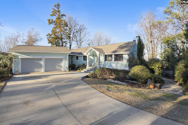 ranch-style home with a garage