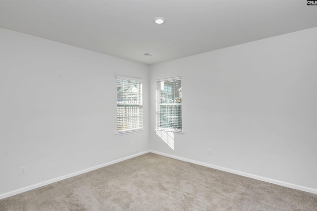 view of carpeted spare room