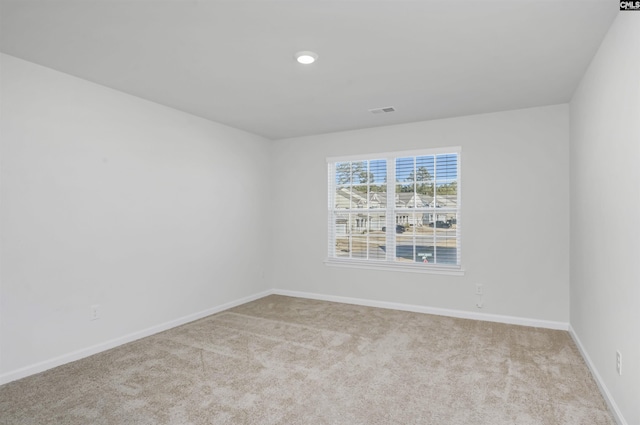 view of carpeted spare room