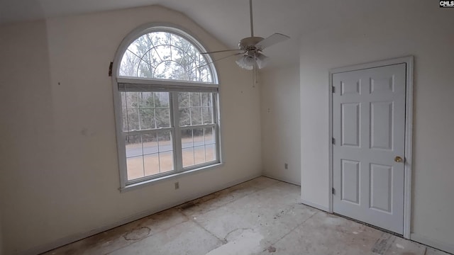 spare room featuring ceiling fan and lofted ceiling