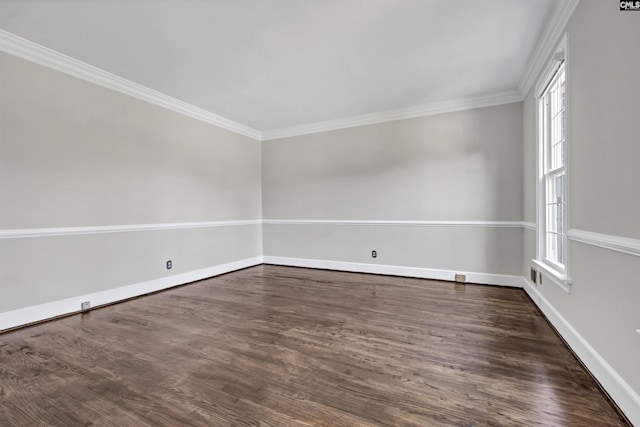 unfurnished room with crown molding, plenty of natural light, and dark wood-type flooring